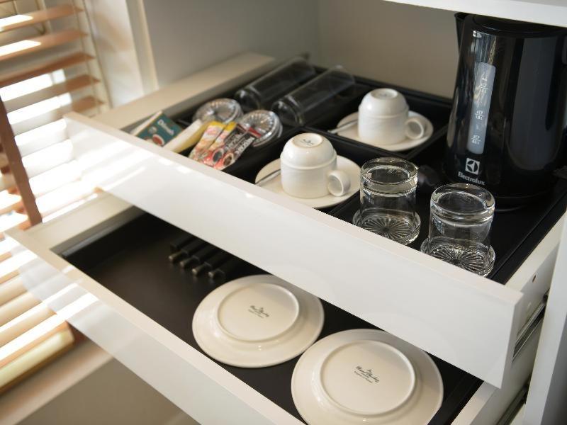 Hotel Grande Centre Point Ploenchit Bangkok Camera foto A drawer with a divider